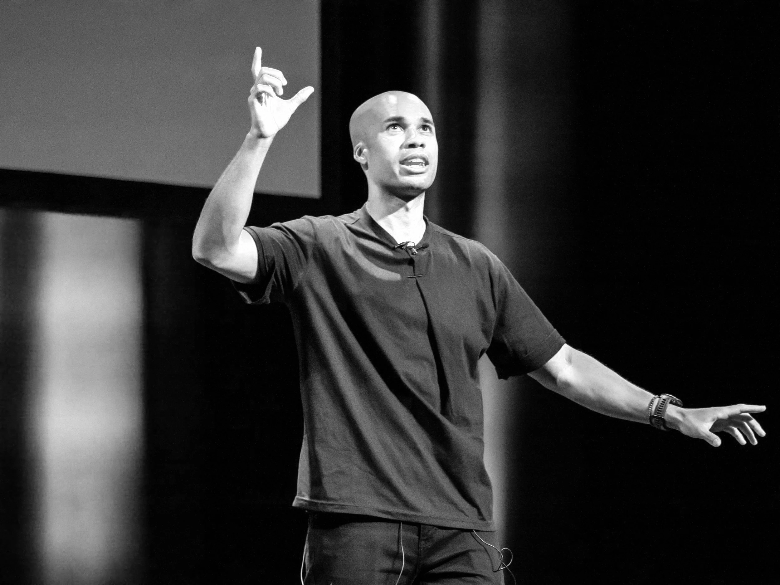 Tucker Bryant delivering a keynote on stage