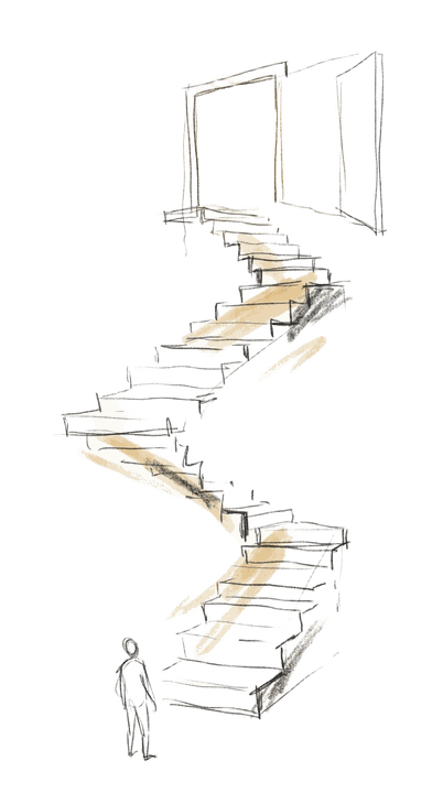A person looking up a staircase toward an open door